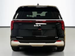 Kia Carnival Hybrid LXS FWD 2026 — side view