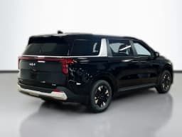 Kia Carnival Hybrid LXS FWD 2026 — side view