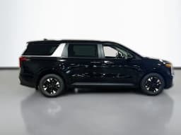Kia Carnival Hybrid LXS FWD 2026 — side view