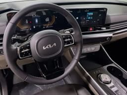 Kia Carnival Hybrid LXS FWD 2026 — side view