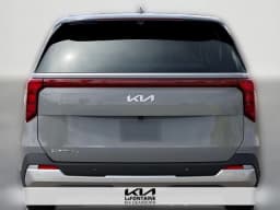 Kia Carnival EX FWD 2026 — side view