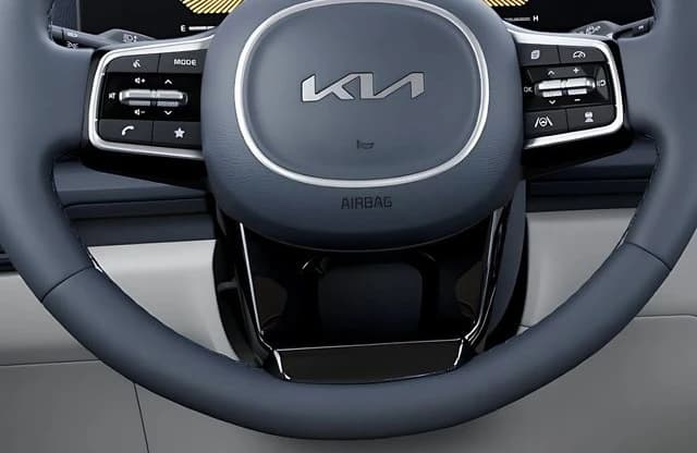 Kia Carnival EX FWD 2026 — side view