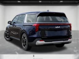Kia Carnival EX FWD 2026 — side view