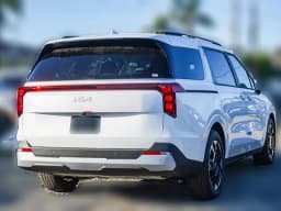 Kia Carnival EX FWD 2026 — side view
