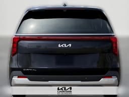 Kia Carnival EX FWD 2026 — side view