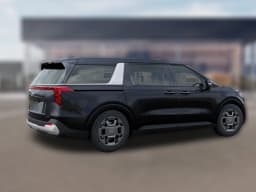 Kia Carnival Hybrid EX FWD 2026 — side view