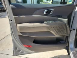 Kia Carnival Hybrid EX FWD 2027 — side view