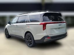 Kia Carnival Hybrid EX FWD 2027 — side view