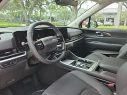 Kia Carnival Hybrid EX FWD 2027 — side view