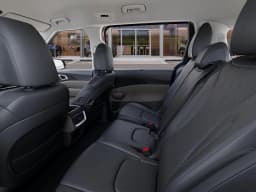 Kia Carnival Hybrid EX FWD 2026 — side view