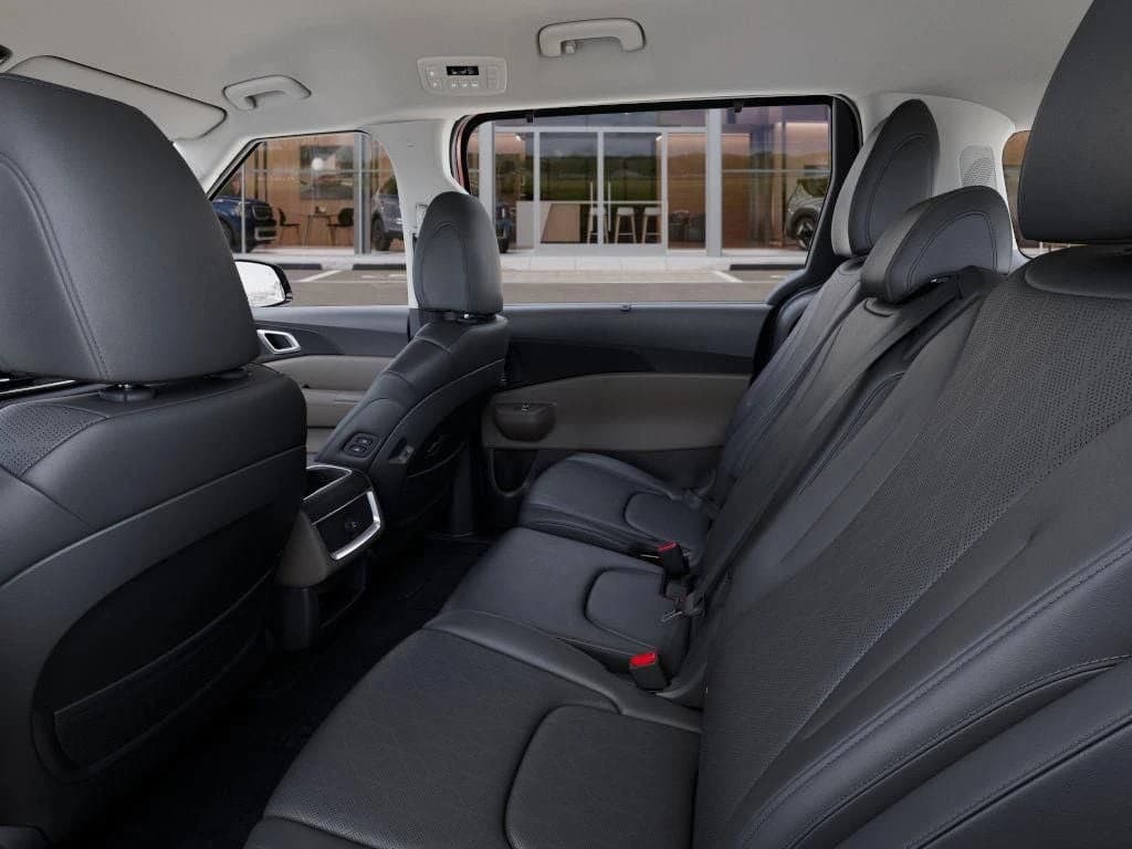 Kia Carnival Hybrid EX FWD 2026 — side view