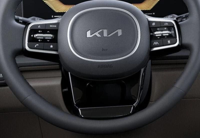 Kia Carnival Hybrid EX FWD 2026 — side view