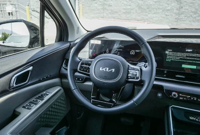 Kia Carnival Hybrid EX FWD 2026 — side view