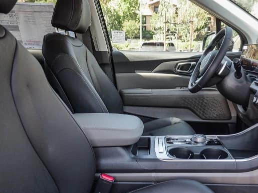 Kia Carnival Hybrid EX FWD 2026 — side view
