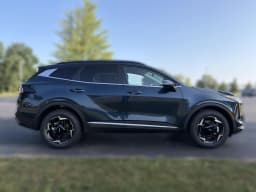 Kia Sportage Hybrid EX AWD 2027 — side view
