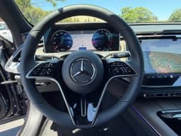 Mercedes-Benz E-Class E 350 4MATIC Sedan 2026 — side view