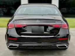 Mercedes-Benz E-Class E 450 4MATIC Sedan 2026 — side view