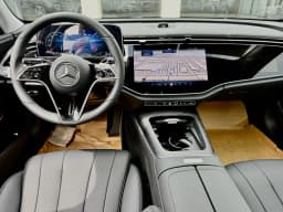 Mercedes-Benz E-Class E 450 4MATIC Sedan 2026 — side view
