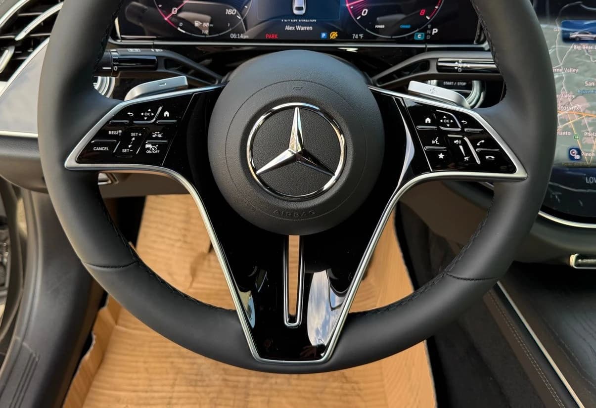 Mercedes-Benz E-Class E 450 4MATIC Sedan 2026 — side view