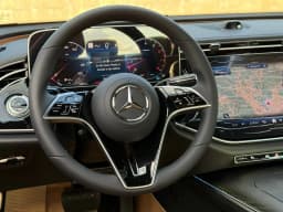 Mercedes-Benz E-Class E 450 4MATIC Sedan 2026 — side view
