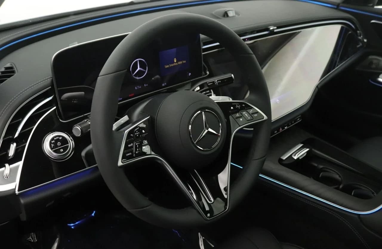 Mercedes-Benz E-Class E 450 4MATIC Sedan 2026 — side view