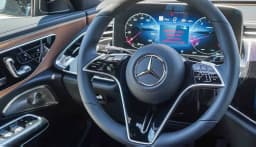 Mercedes-Benz E-Class E 450 4MATIC Sedan 2026 — side view