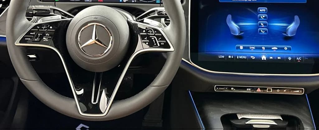 Mercedes-Benz E-Class E 450 4MATIC Sedan 2026 — side view