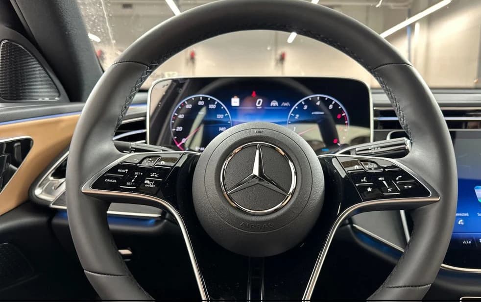 Mercedes-Benz E-Class E 450 4MATIC Sedan 2026 — side view
