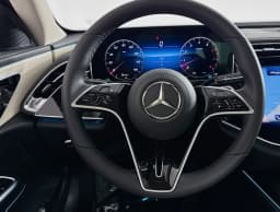 Mercedes-Benz E-Class E 450 4MATIC Sedan 2026 — side view
