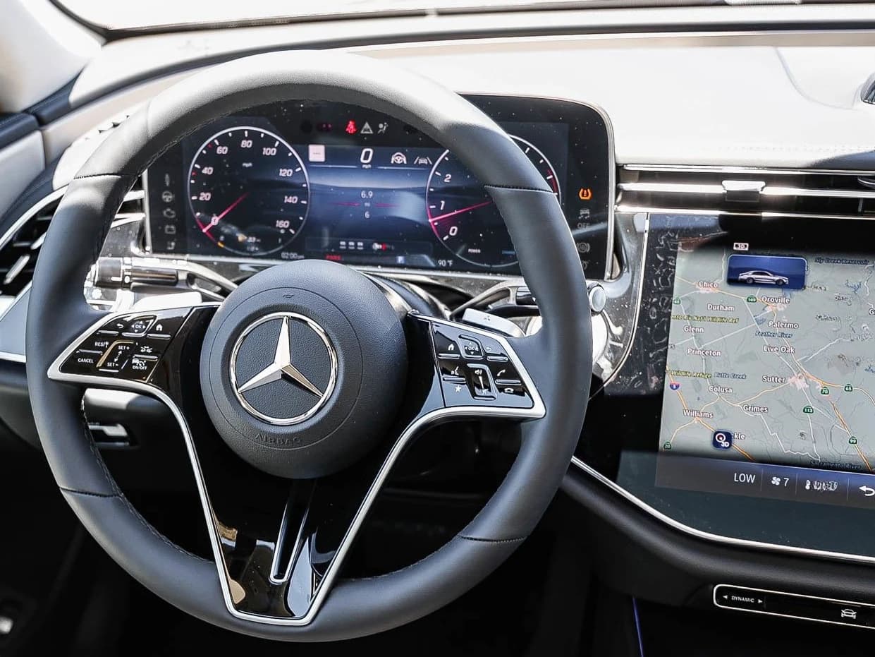 Mercedes-Benz E-Class E 450 4MATIC Sedan 2026 — side view
