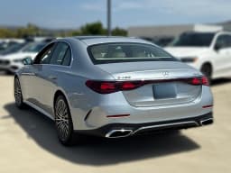 Mercedes-Benz E-Class E 450 4MATIC Sedan 2026 — side view