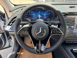 Mercedes-Benz E-Class E 450 4MATIC Sedan 2026 — side view