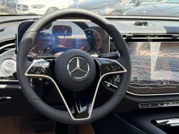 Mercedes-Benz E-Class E 450 4MATIC Sedan 2026 — side view