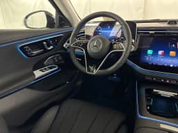 Mercedes-Benz E-Class E 450 4MATIC Sedan 2026 — side view