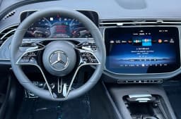 Mercedes-Benz E-Class E 450 4MATIC Sedan 2026 — side view