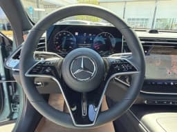 Mercedes-Benz E-Class E 450 4MATIC Sedan 2026 — side view