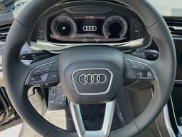 Audi Q7 Premium 45 quattro 2026 — side view