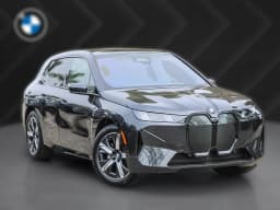 BMW iX xDrive60 Sports Activity Vehicle 2026 — side view