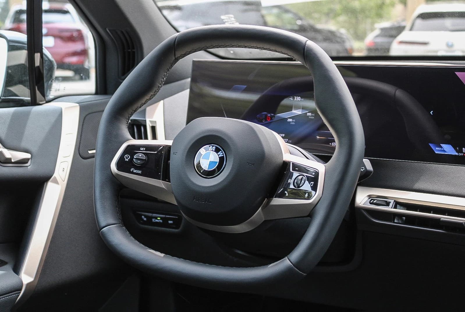 BMW iX xDrive60 Sports Activity Vehicle 2026 — side view