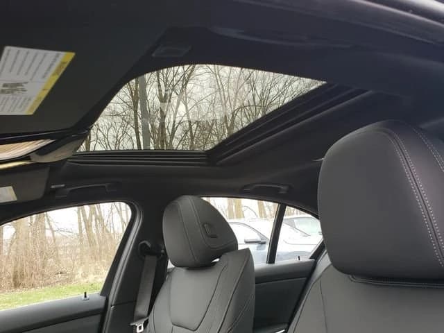BMW 3 Series 330i xDrive Sedan 2026 — side view