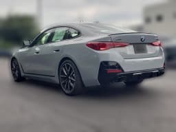 BMW 4 Series M440i xDrive Gran Coupe 2026 — side view