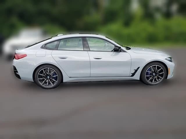 BMW 4 Series M440i xDrive Gran Coupe 2026 — side view