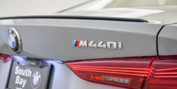 BMW 4 Series M440i xDrive Coupe 2026 — side view
