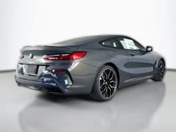 BMW 8 Series 840i Coupe 2026 — side view