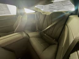 BMW 8 Series 840i Coupe 2026 — side view