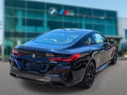 BMW 8 Series 840i Coupe 2026 — side view
