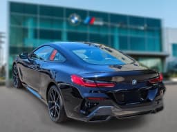 BMW 8 Series 840i Coupe 2026 — side view