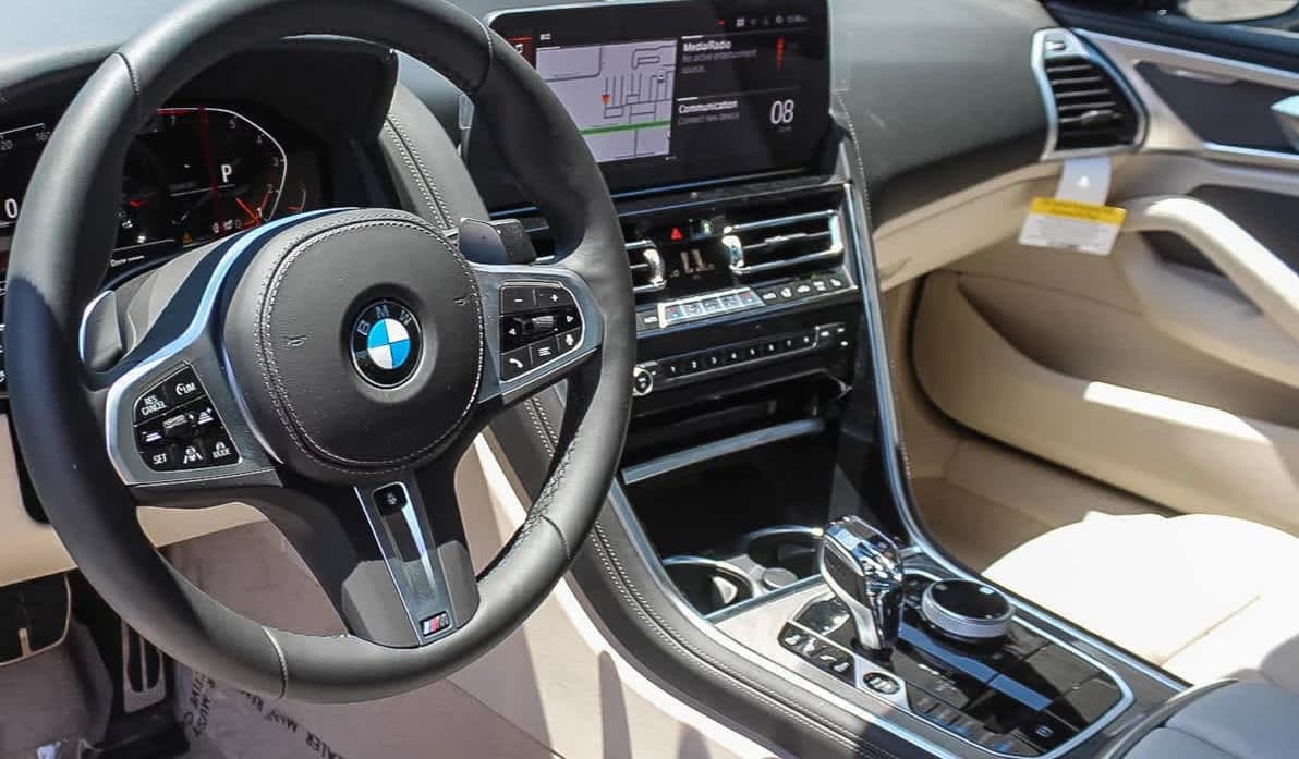 BMW 8 Series 840i Coupe 2026 — side view