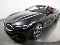 BMW 8 Series 840i Convertible 2026 — side view