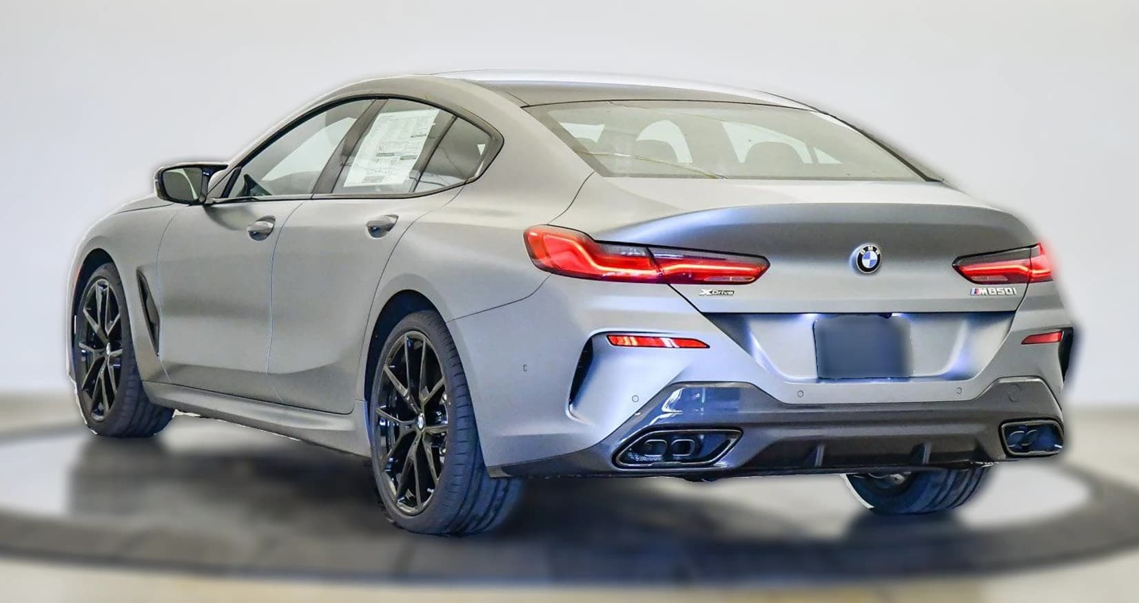 BMW 8 Series M850i Gran Coupe 2026 — side view
